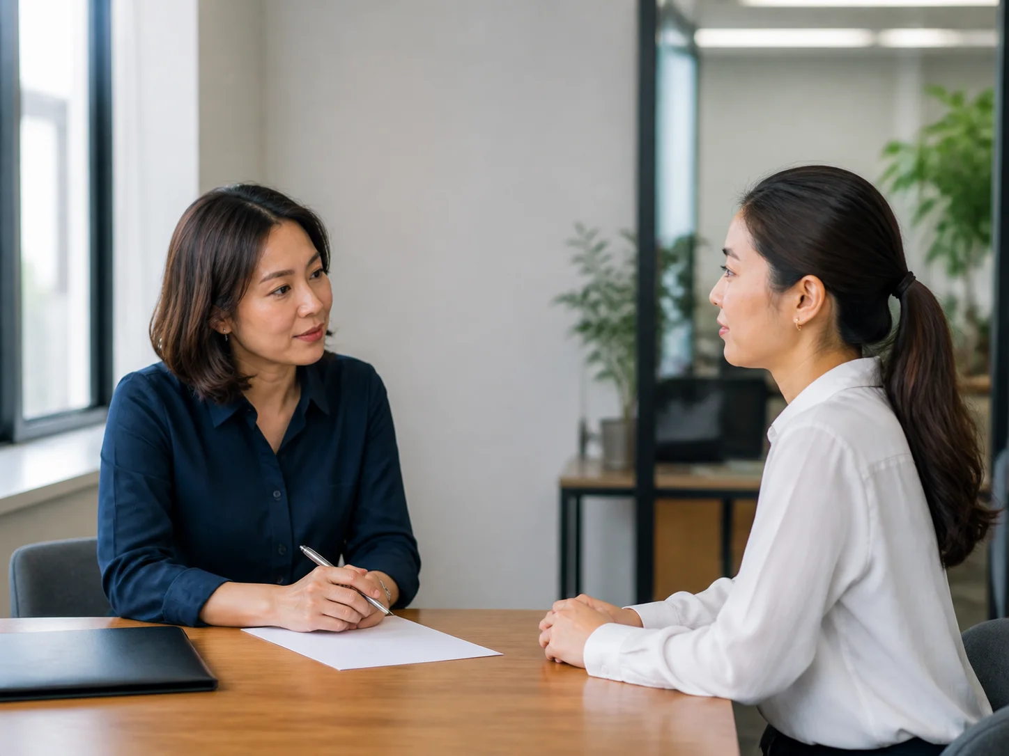Professional candidate speaking with a recruiter in Bangkok